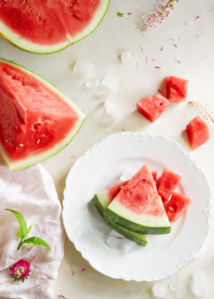 sliced watermelon on a white plate