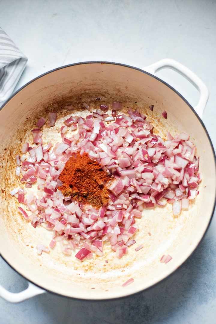 cooking onions in a pan