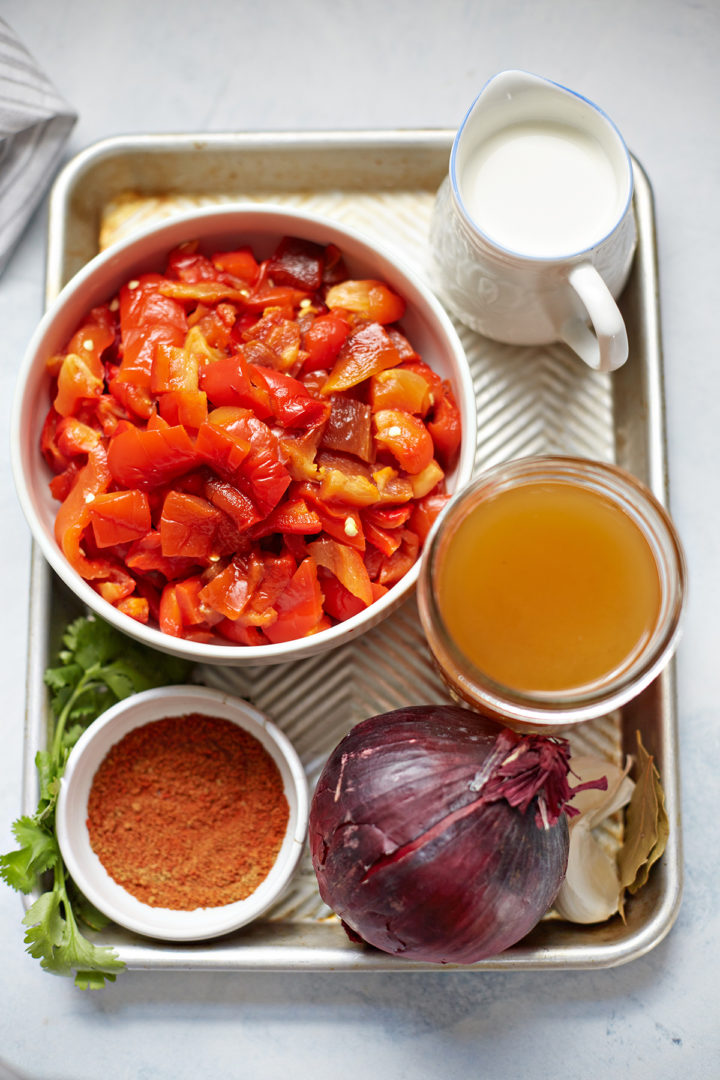 a tray of ingredients to use in recipe for roasted red pepper soup