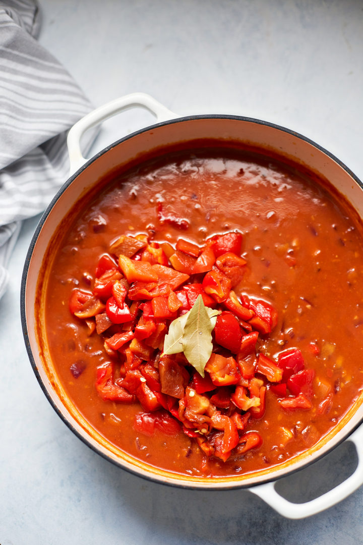 a pot of roasted red pepper soup being prepared