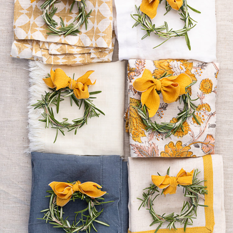 rosemary wreath place cards with cloth napkins