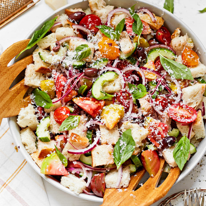 summer panzanella in a white bowl