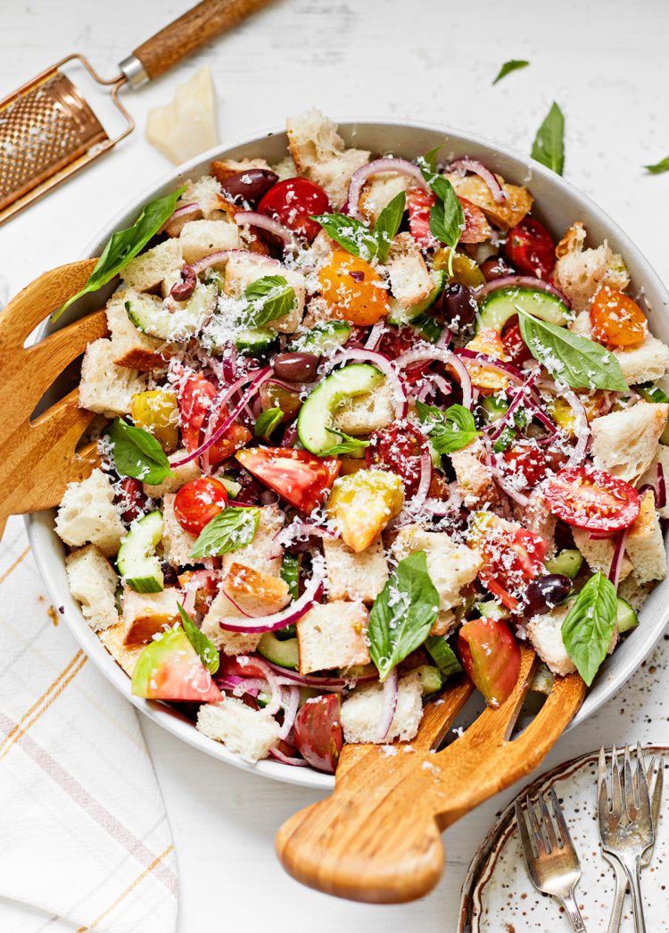 summer panzanella in a white bowl