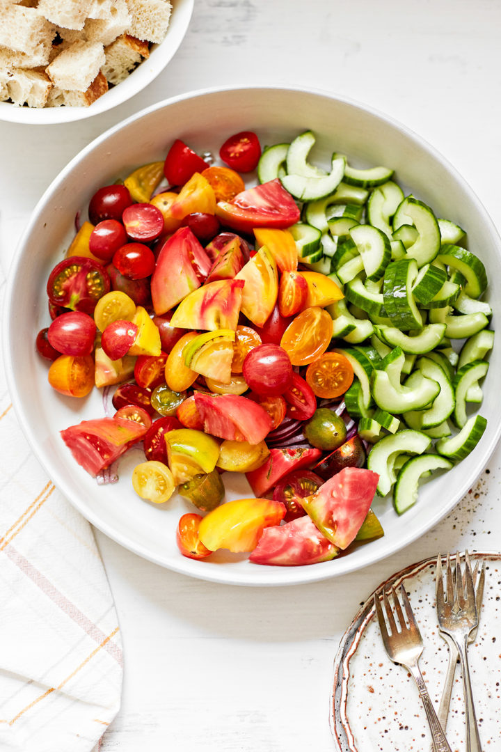 tomatoes and cucumbers in a bowl