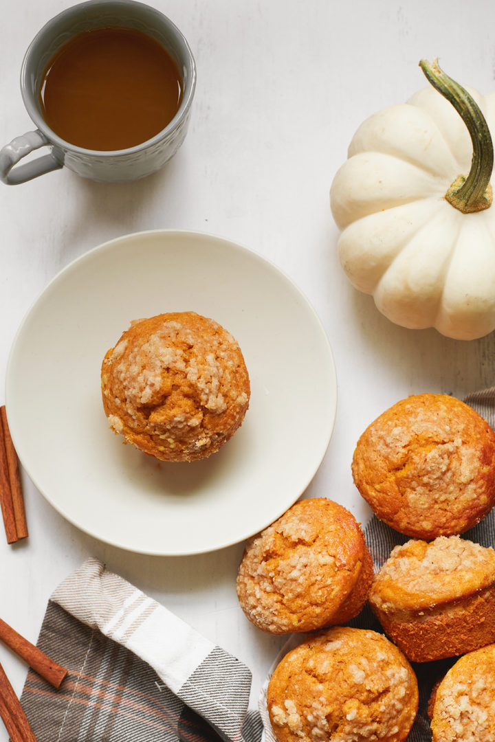 pumpkin spice protein muffin on a white plate