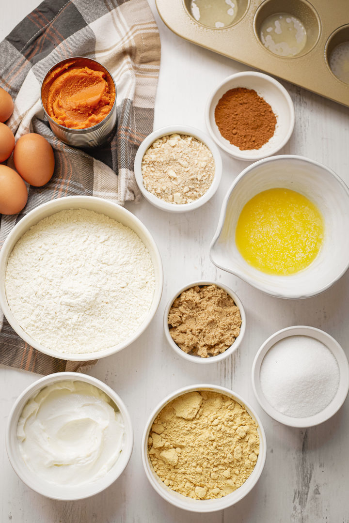 bowls of ingredients for making high protein pumpkin muffins