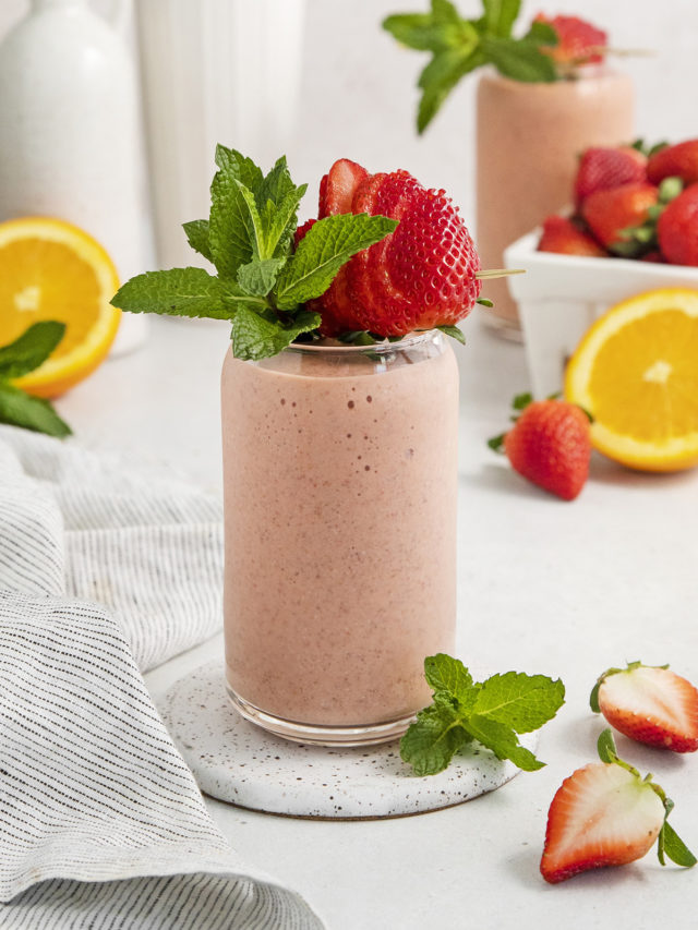 passion fruit smoothie in a glass with fresh mint garnish