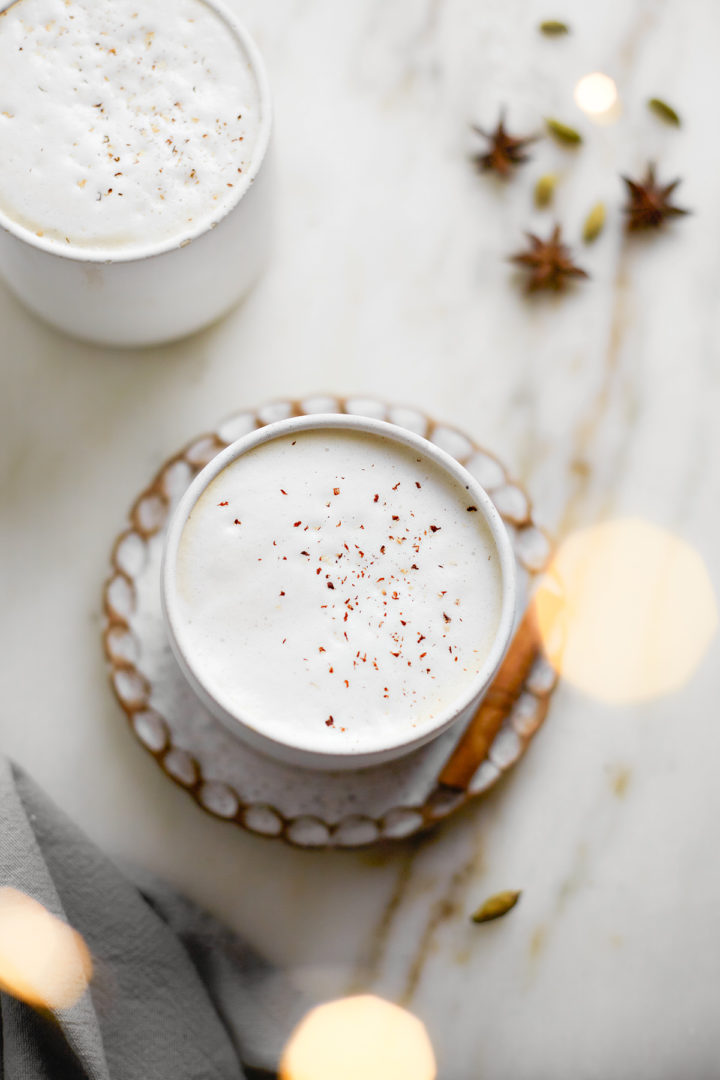 homemade chai latte in white mugs