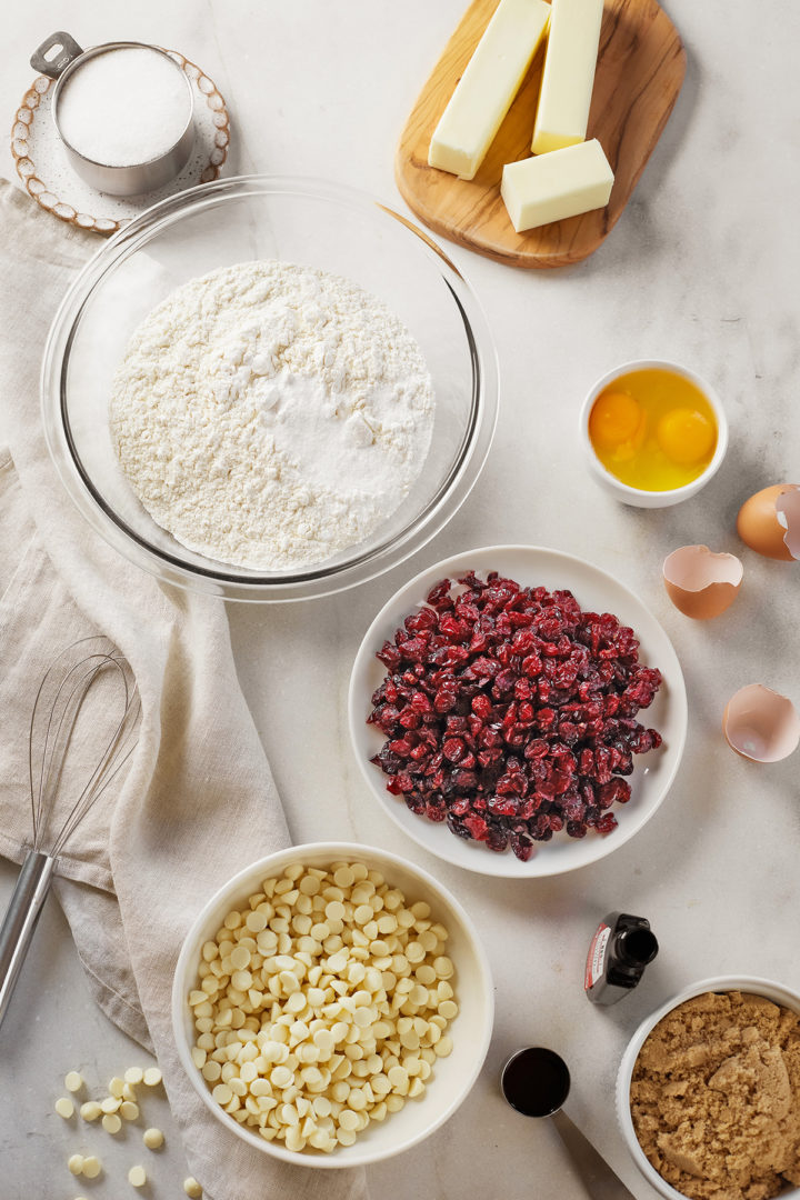 bowls of ingredients to make cranberry white chocolate cookies