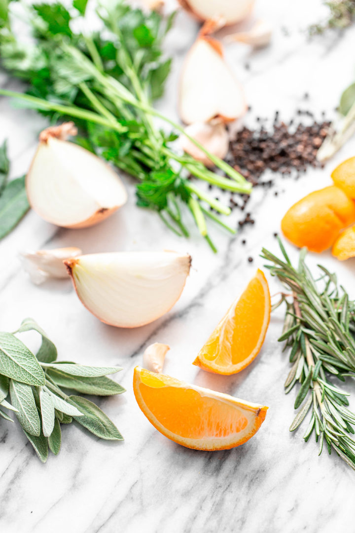 citrus, onion, and herbs for seasoning a thanksgiving turkey