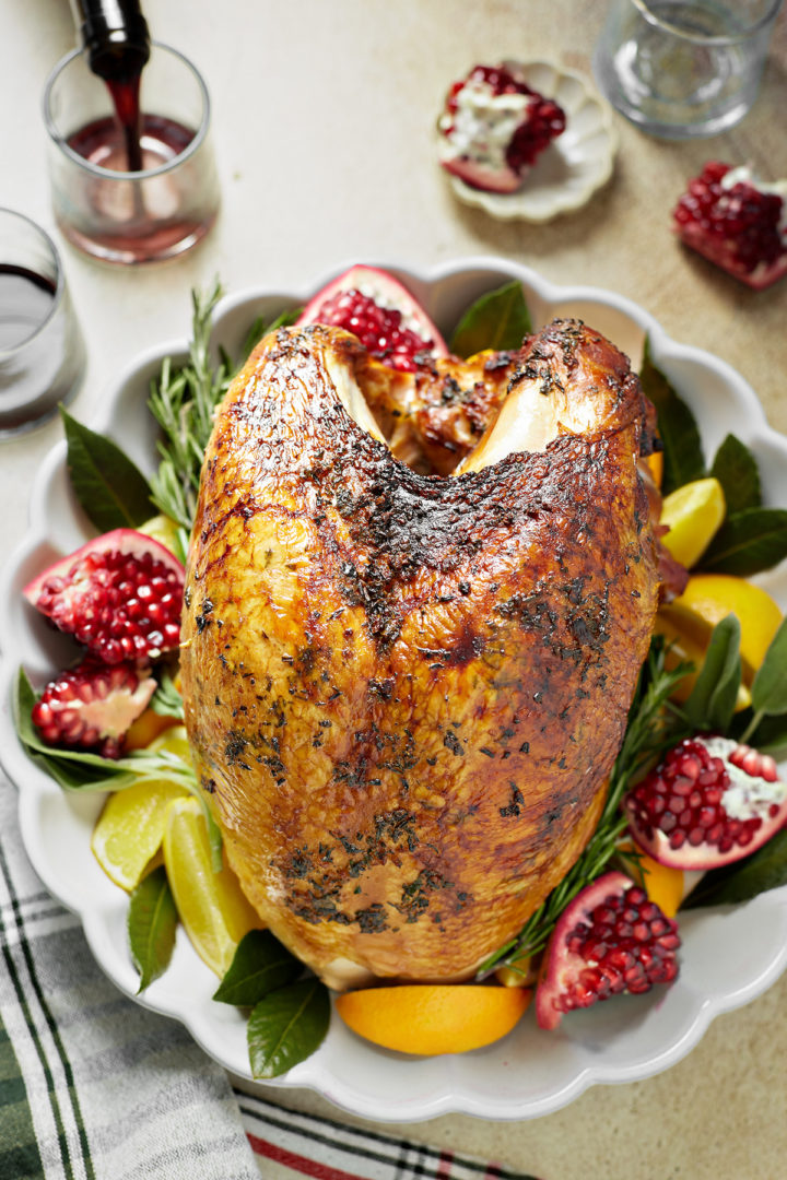 smoked turkey breast on a platter at the table