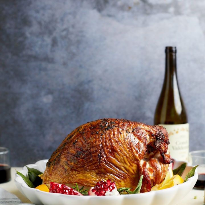 stuffed roasted turkey on a platter