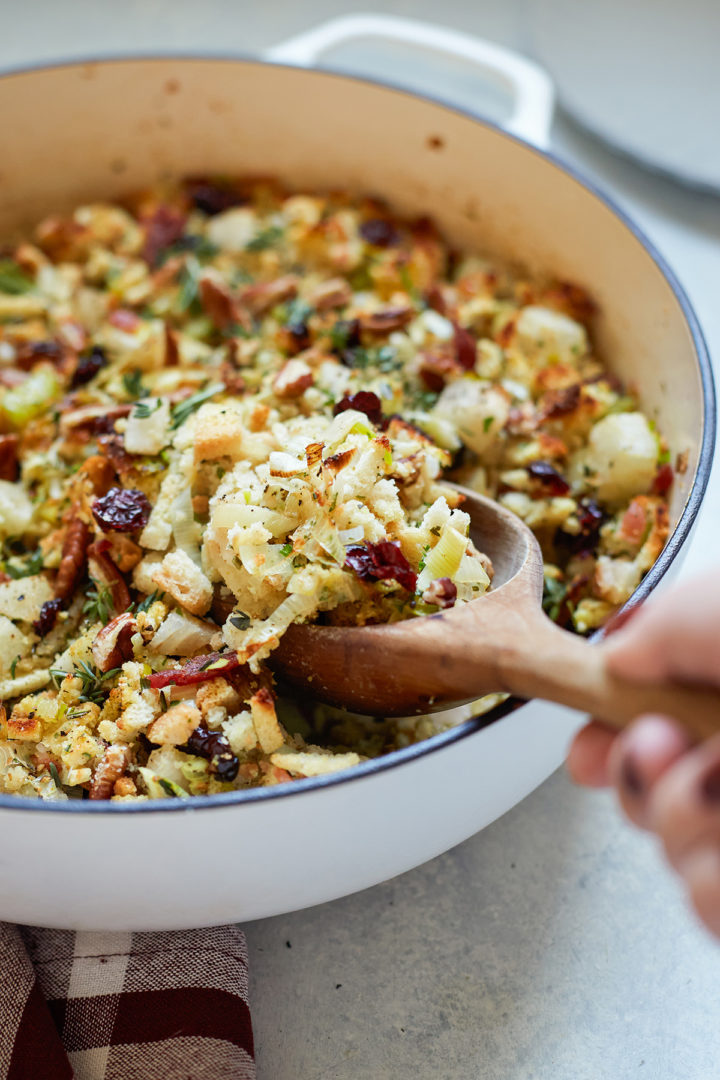 woman serving stuffing for turkey