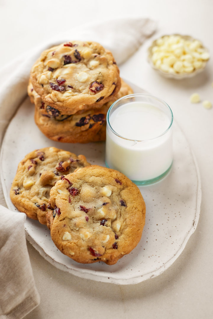 a plate of cranberry white chocolate cookies