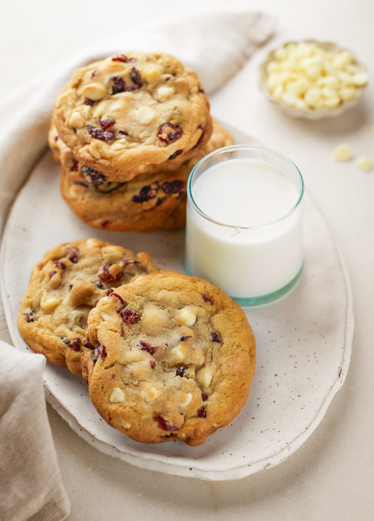 a plate of cranberry white chocolate cookies