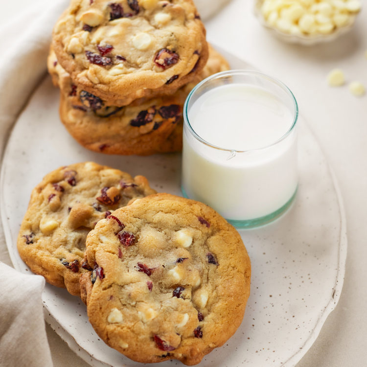 a plate of cranberry white chocolate cookies