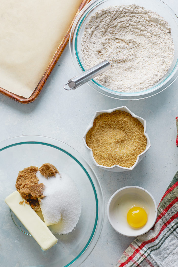 ingredients for gingersnap cookies in bowls