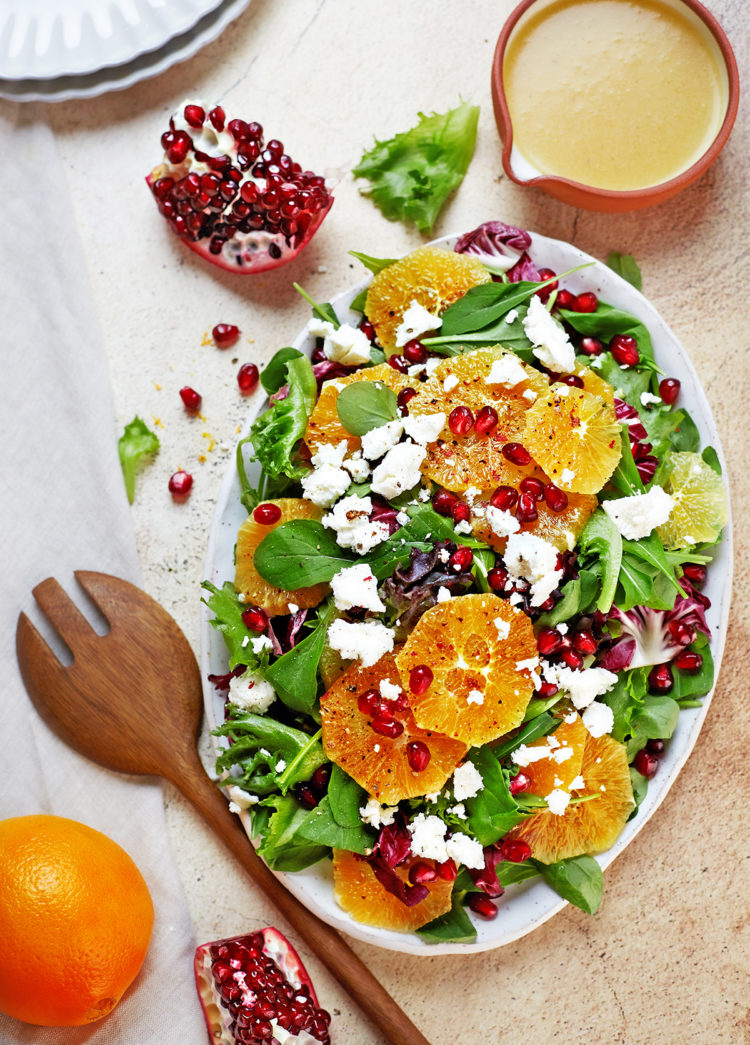 citrus and arugula salad on a platter