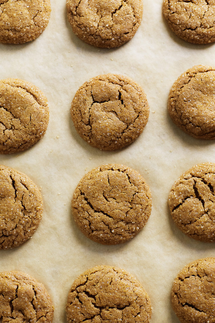 close up view of a baking sheet of homemade gingersnaps cookies