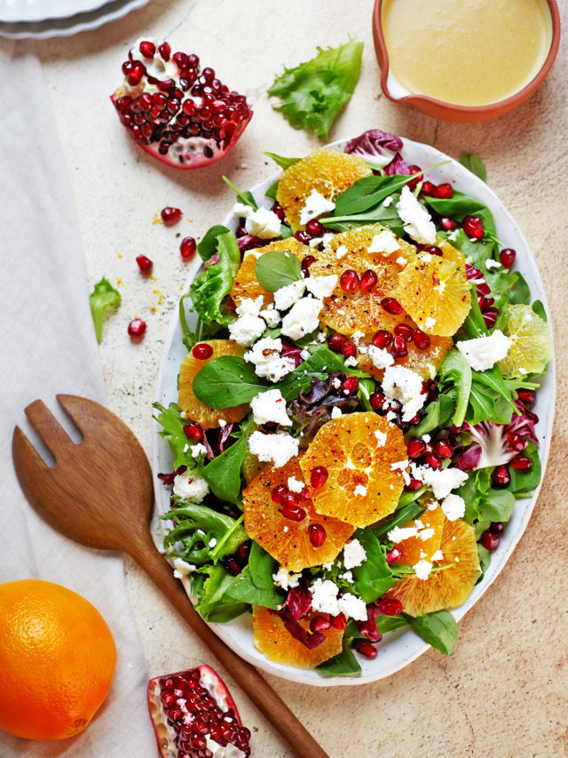 citrus and arugula salad on a platter