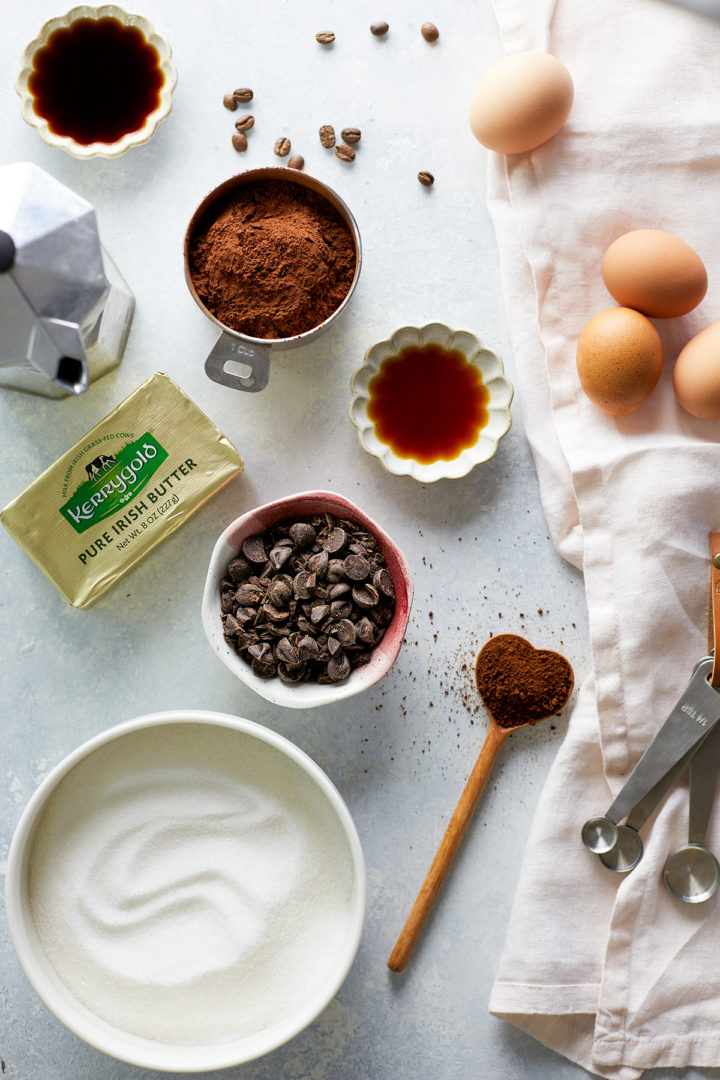 brownie ingredients arranged on a light blue background